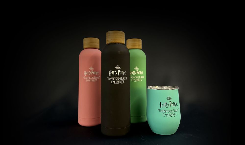 Various Forbidden Forest-branded mugs and flasks.