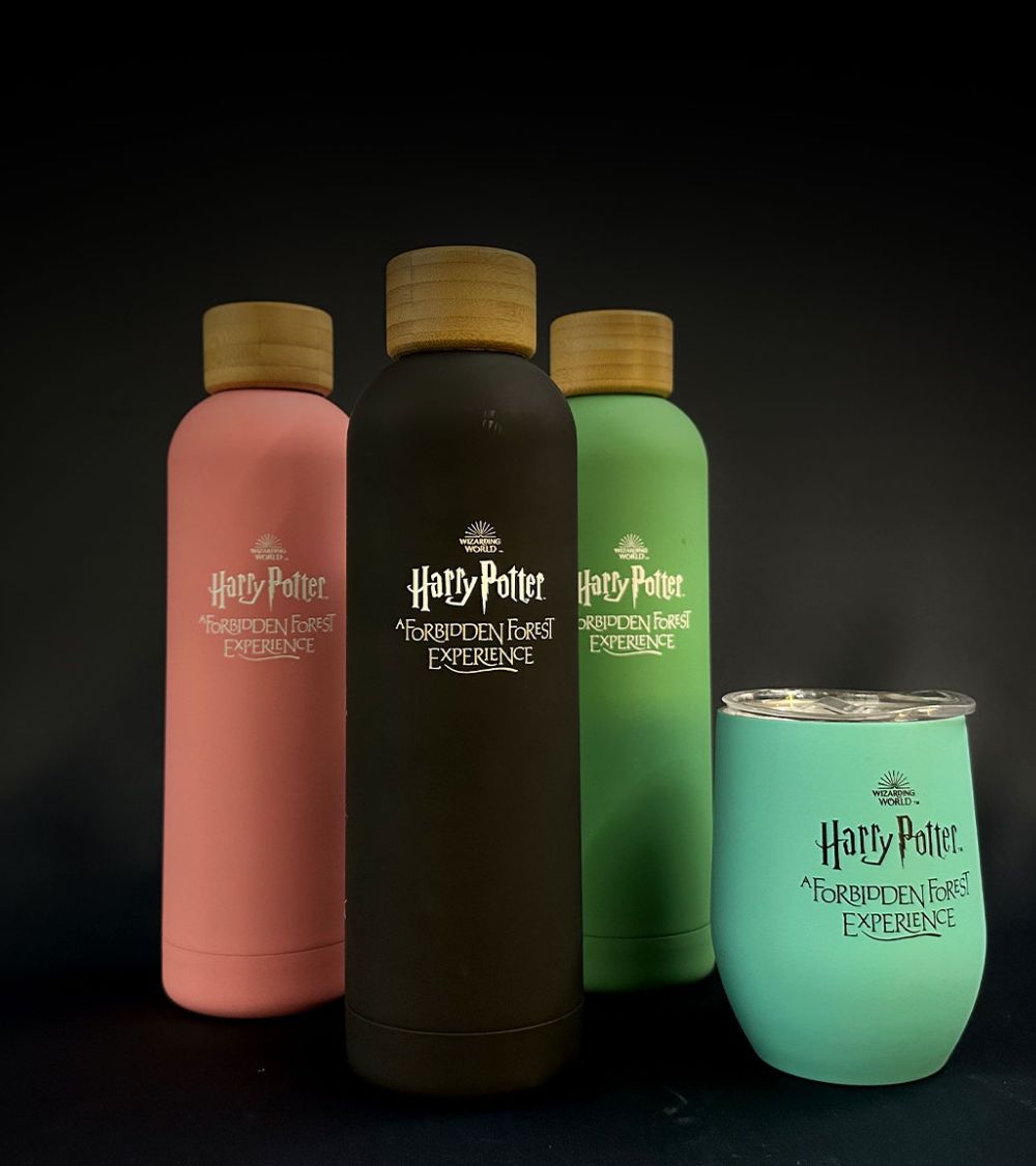 Various Forbidden Forest-branded mugs and flasks.