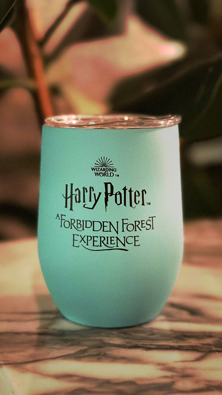 A teal thermal mug.