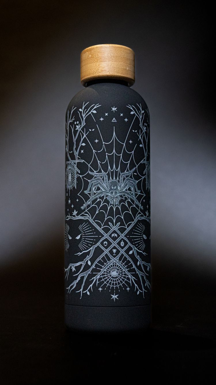 A water bottle with Aragog artwork.