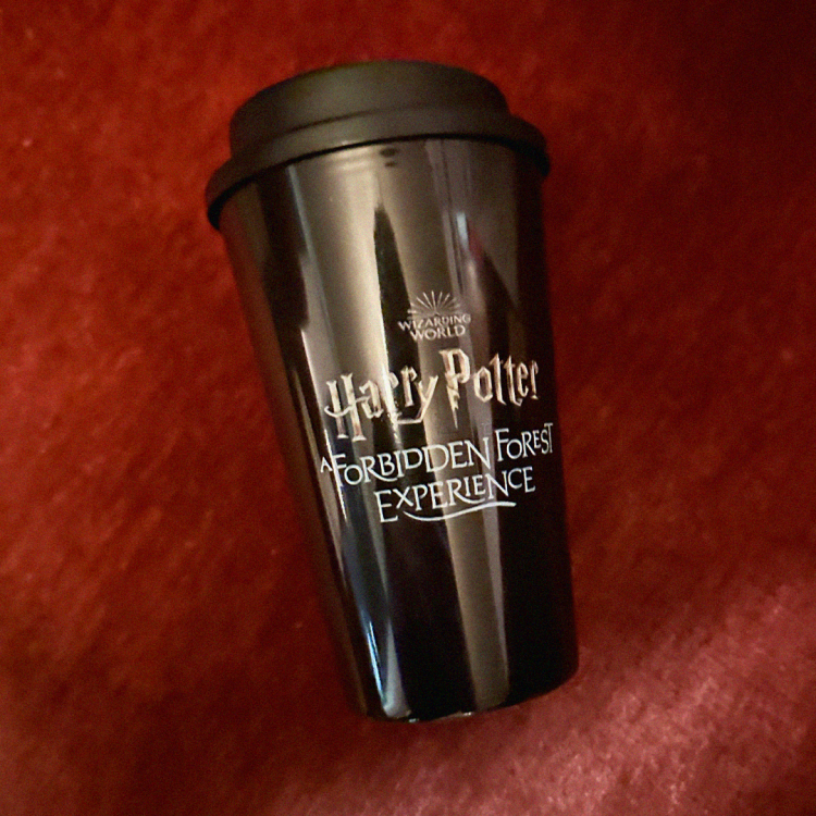 A bronze colored heated cup.