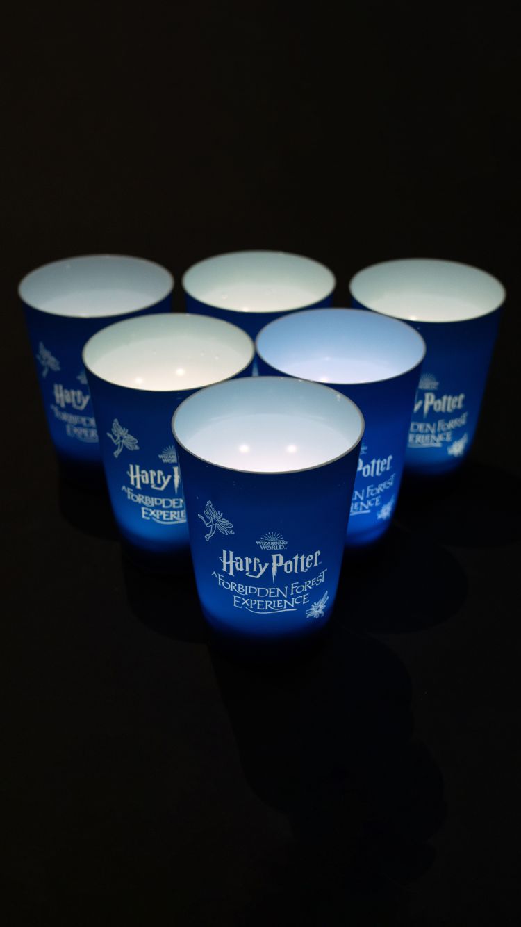 Blue Forbidden Forest cups lit up from the inside.