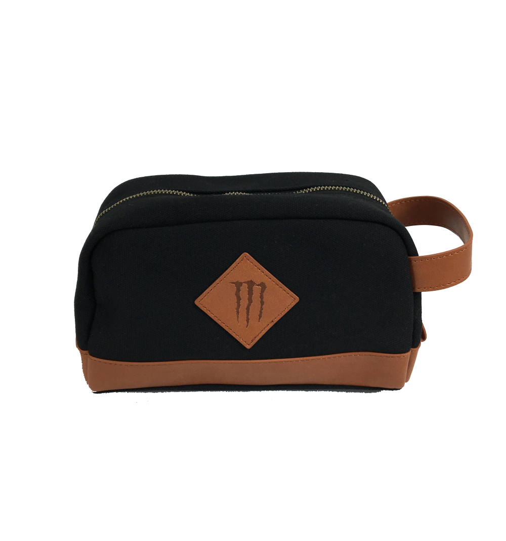 Monster-branded leather travel wash bag.