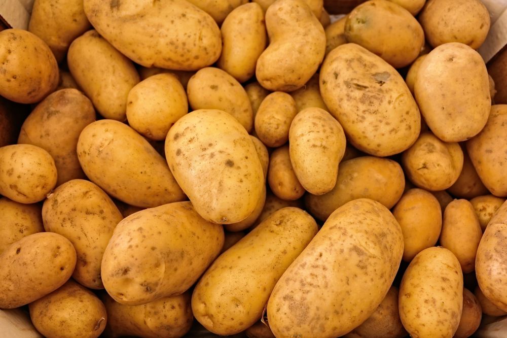 A box of packed potatoes.