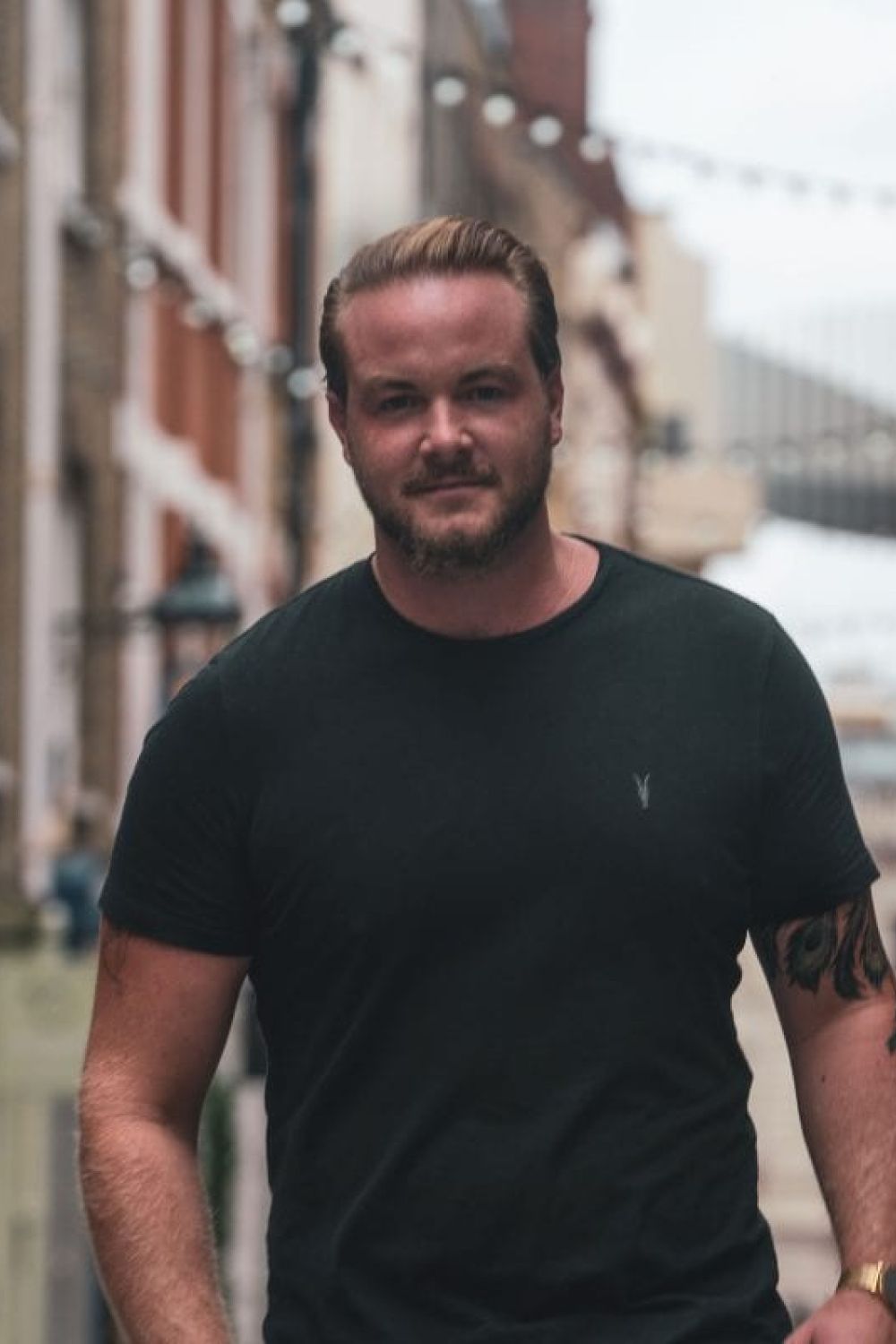 Martin Dunn walking in Covent Garden.
